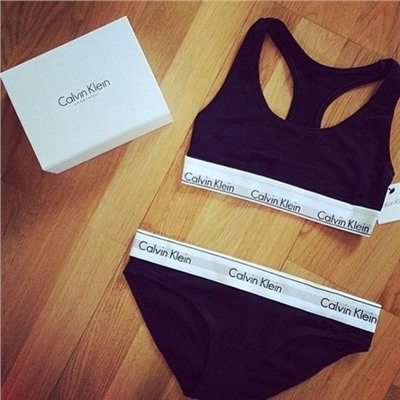 Женский комплект Calvin Klein с чашечками черный: топ и плавки C01